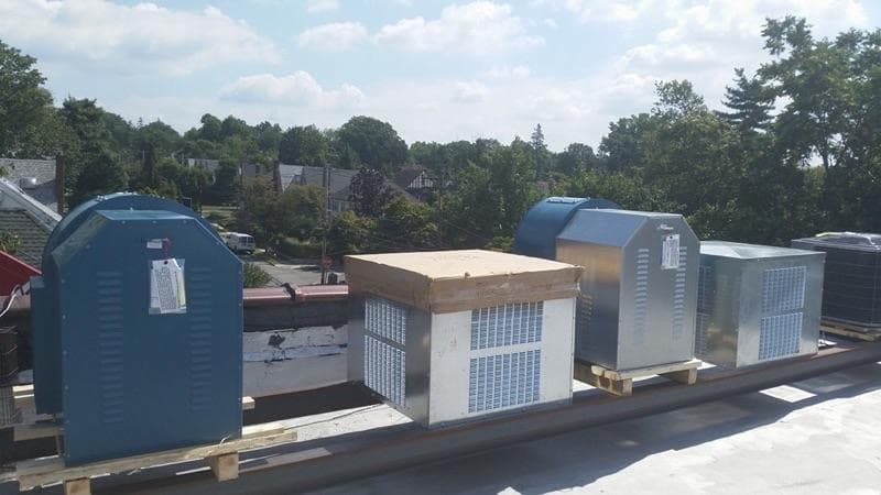 Rooftop HVAC condenser unit on a commercial building